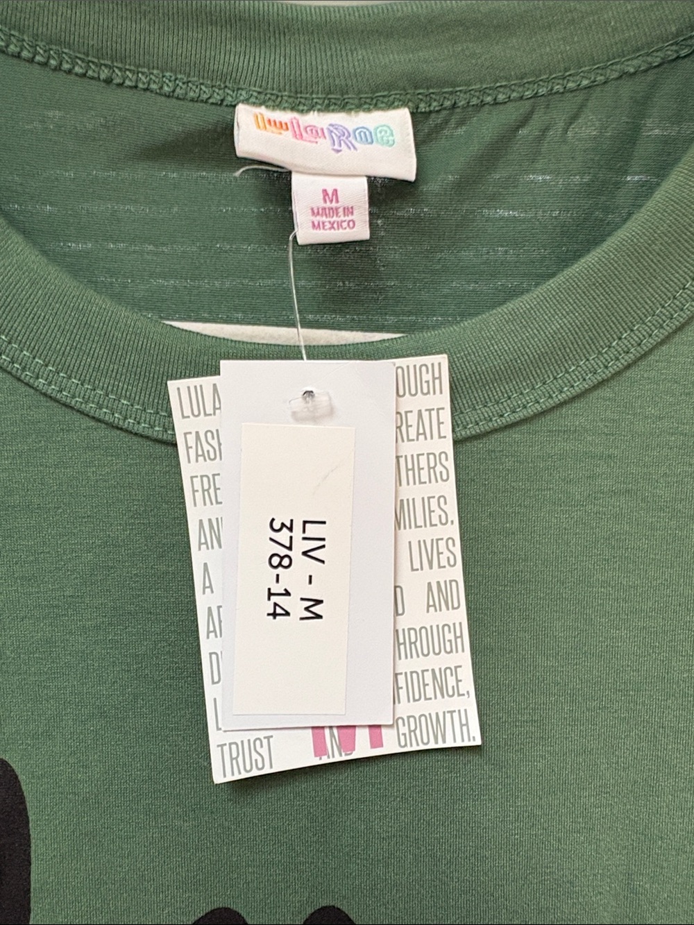 LuLaRoe Green Graphic Tee with Black Paw Heart - Picture 2 of 2